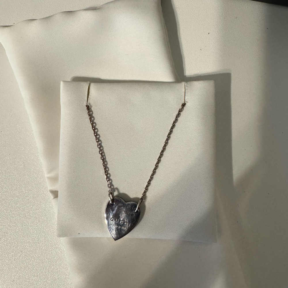 Gucci Silver bracelet with heart Pendant